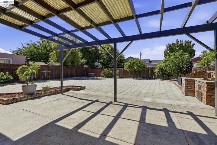 Spacious. Lots of potentials. Recently paved stepping stones.