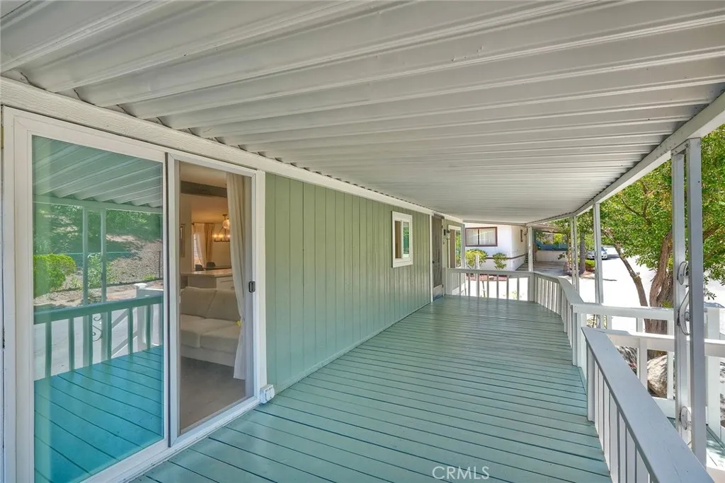 LARGE DECK ON FRONTOF PROPERTY.