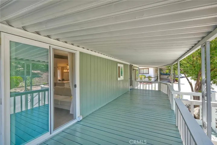 LARGE DECK ON FRONTOF PROPERTY.