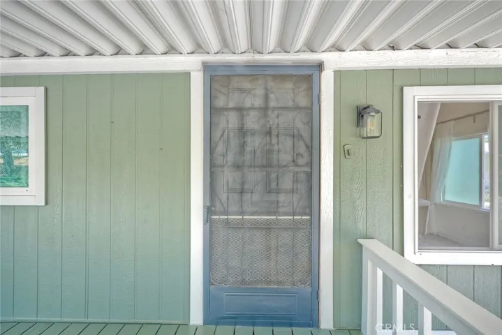 DOUBLE PANED WINDOWS AND NEWER FRONT DOOR.