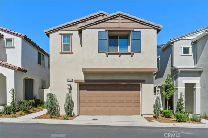 Two car garage with bonus storage space.