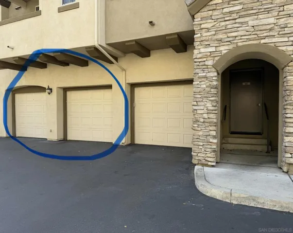 Back door on right.  Two 1 car garages side by side.