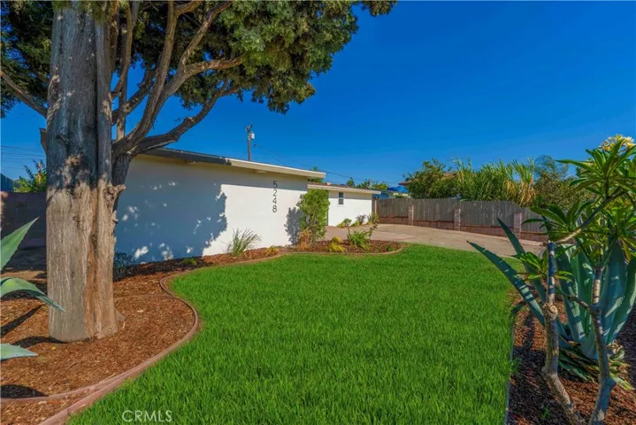 Front yard view. Grass was virtually enhanced.