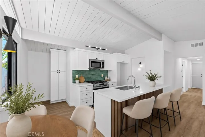 Kitchen area open concept virtually staged