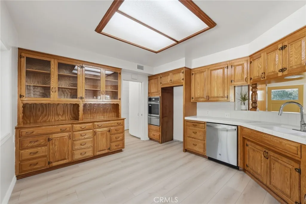 New oven and Dishwasher, custom wood cabinet.