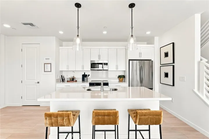 Photos are of model homes - interior and exterior finishes may vary