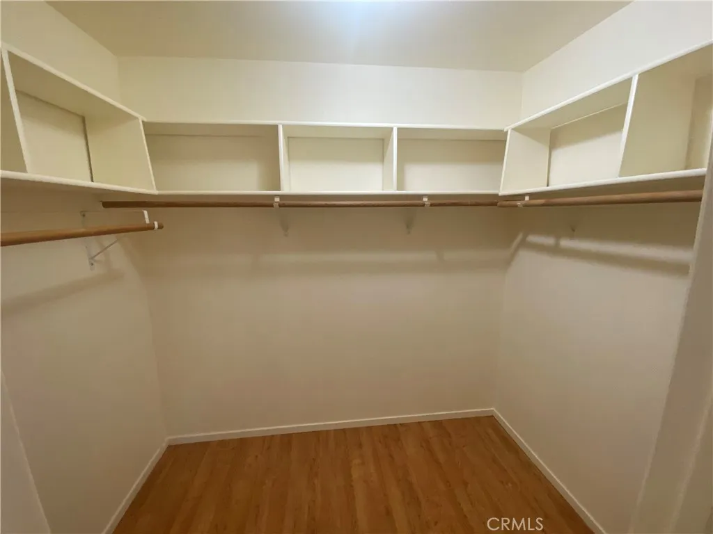 Primary bedroom closet. Primary bedroom closet.