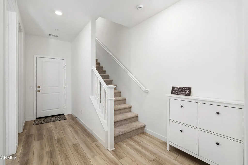 foyer with staircase 1 and garage access