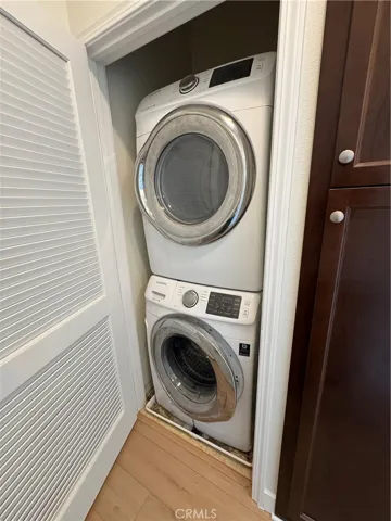 Laundry conveniently located in hallway between primary and guest bedrooms, 3rd level - original photo (no AI used)