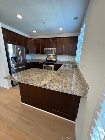 Kitchen View 2, main level, 2nd floor (virtually staged with AI)