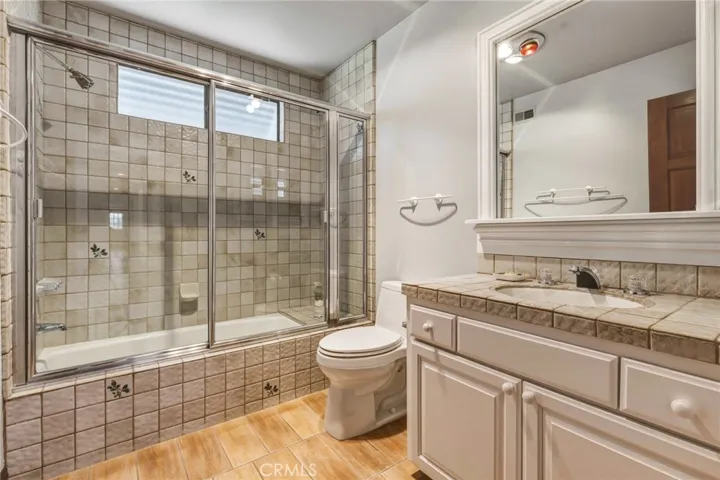 Main bathroom serves the bedrooms at the end of the hall