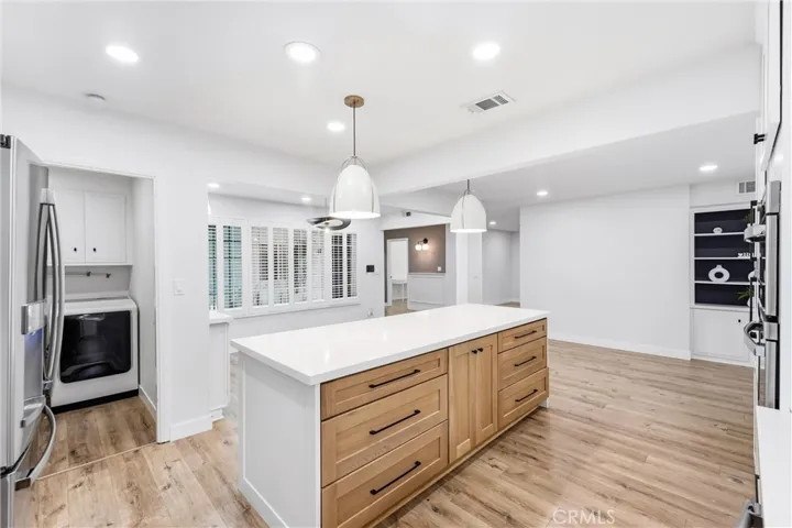 Kitchen / laundry room / dining area