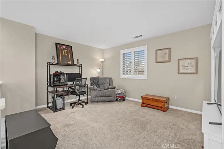 This expansive loft is situated immediately at the top of the staircase.