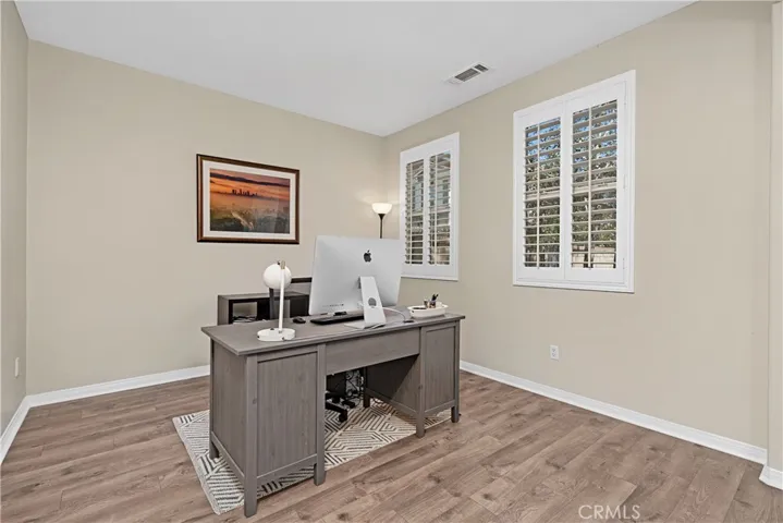 Den downstairs can be used as a bedroom or office space as you enter