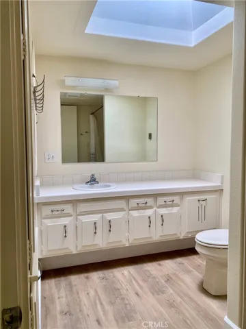 TILE COUNTER TOP AND LARGE SKY LIGHT