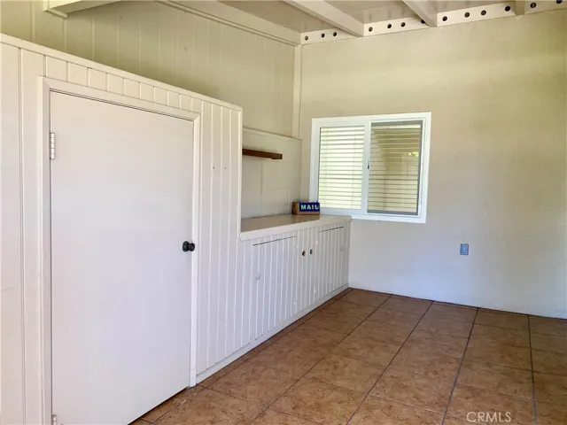 SIDE PATIO W/PLENTY OF STORAGE