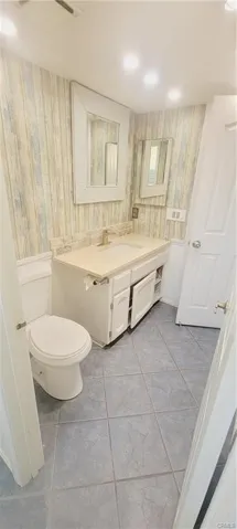 guest bathroom next to a bedroom