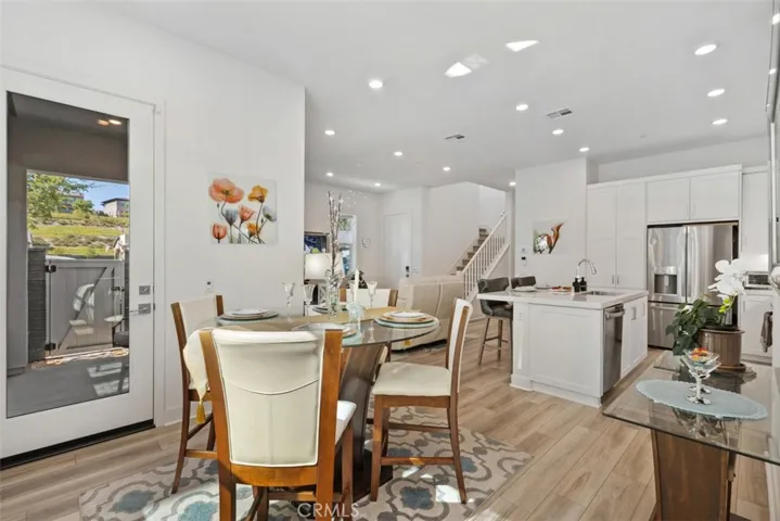 Dining with adjacent outdoor patio