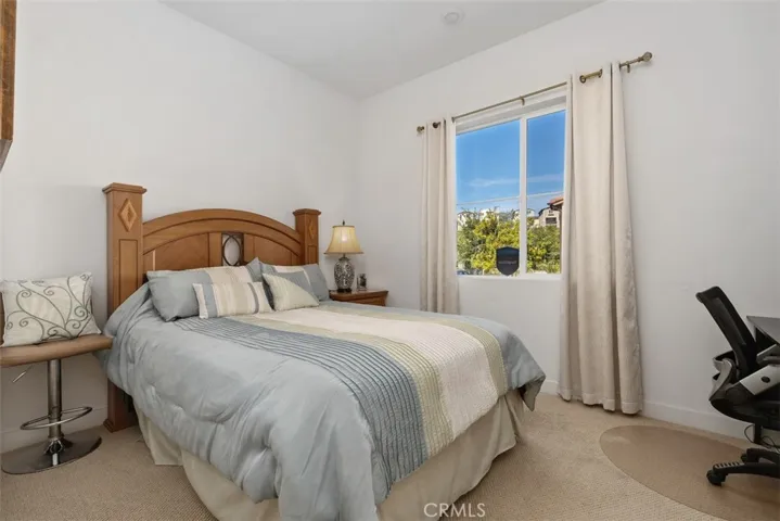 Loft level third bedroom with views