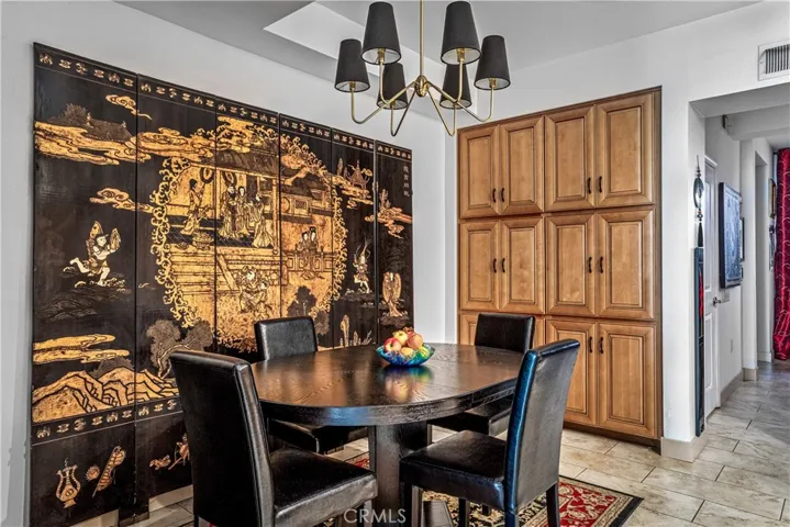 Dedicated dining area with built-in cabinetry and ample room for entertaining.