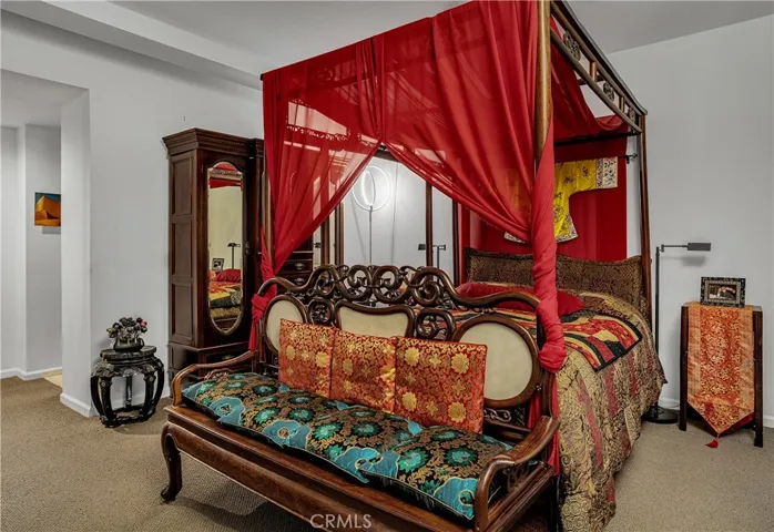 Expansive primary bedroom showcasing its impressive scale.