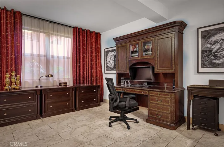 Bright first floor flex space suitable for working from home, hobbies, or additional living space.