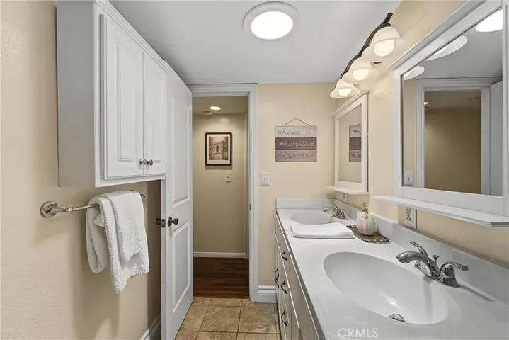 Hallway Bathroom with Tubular Skylighting