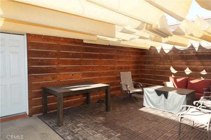 Beautifully paneled walls on patio for extra living space to​​‌​​​​‌​​‌‌​​‌​​​‌‌​​​‌​​‌‌​​‌‌​​‌‌​​​​ entertain