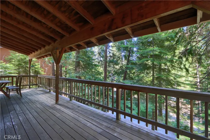 Beautiful Covered Deck for Summer BBQ's and Outdoor Dining with a large crown if need be.