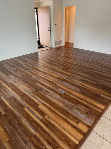 Entrance with living room area and new laminate flooring