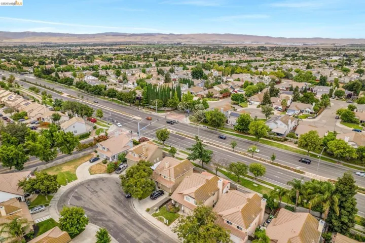 Residential neighborhood featuring mature trees and a comprehensive road network