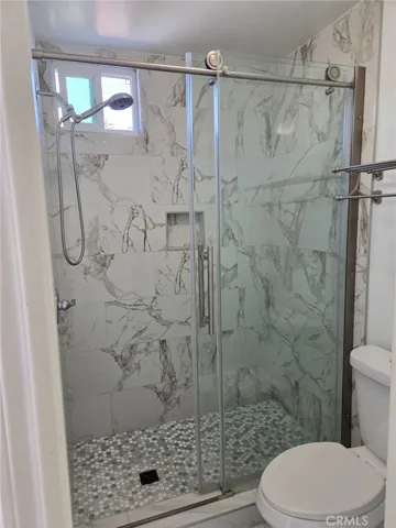 primary walk in shower bathroom