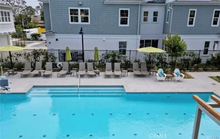 A large community pool is located just a few steps from the unit.