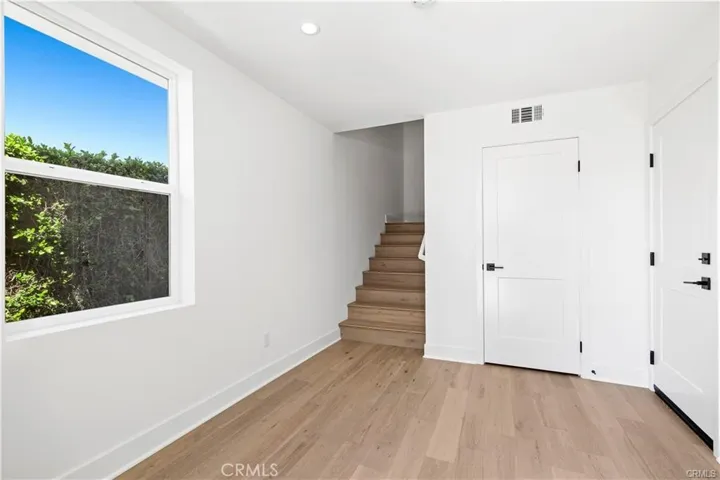1st floor spacious entry with a door for direct access to the garage, and a large storage closet.