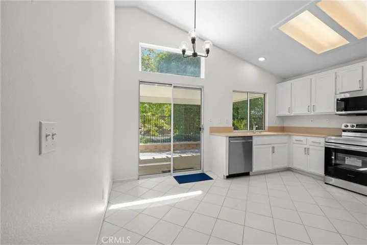Sliding door in the kitchen leads to the very private back patio.