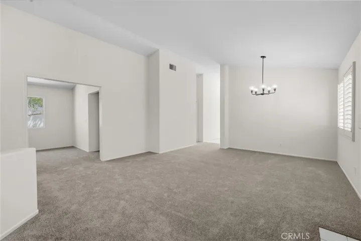 You can see the double door entrance to the middle bedroom / den  / office.