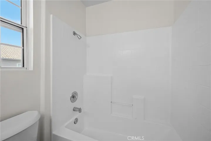 The low maintenance tub / shower combo in the secondary bathroom.