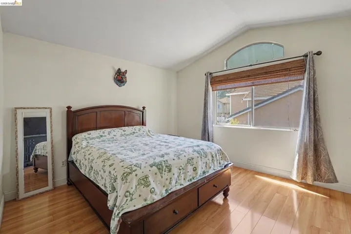 Vaulted ceiling with an arched transom window