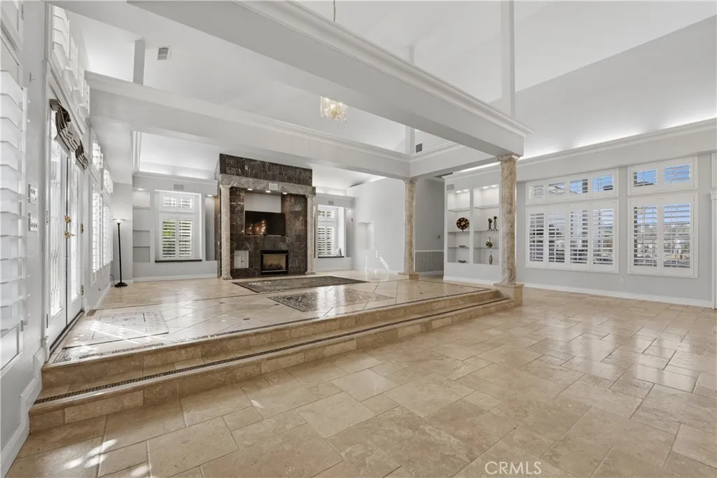 Great Room With Many Custom Built-in Shelves