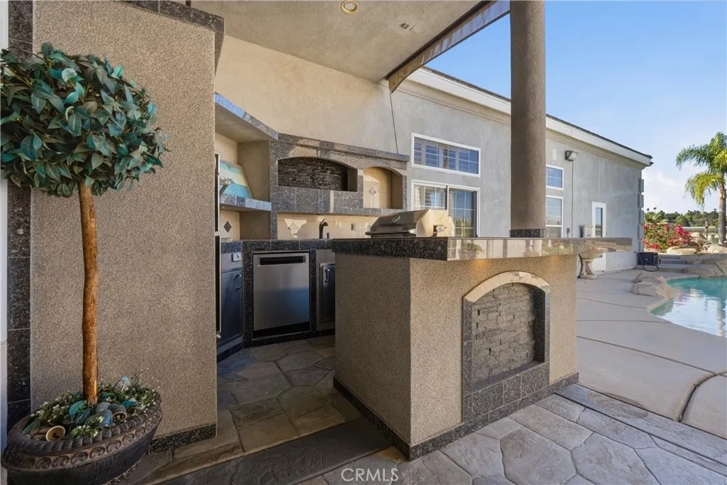 Built -In BBQ with a full Backyard Kitchen