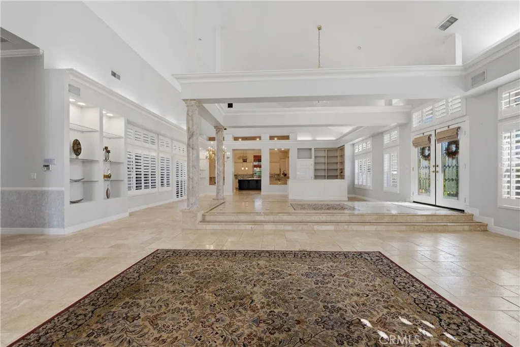 Formal Living/Great Great Room Overlooking Into the Dining, Family Room, and the Kitchen