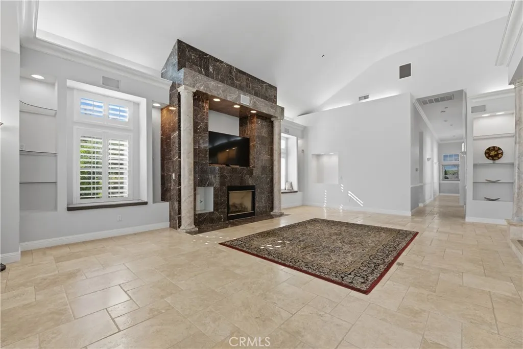 Great Room With Many Custom Built-in Shelves