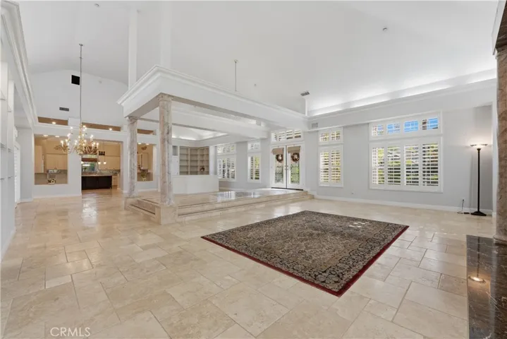 Formal Living/Great Great Room Overlooking Into the Dining, Family Room, and the Kitchen