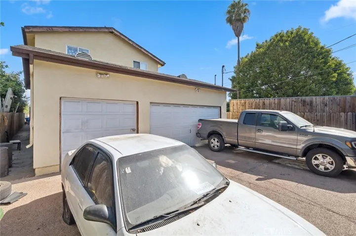 2-car & single car with alley access. Additional parking space in front of garages.