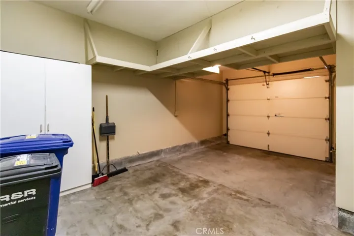 Storage cabinets in the single car attached garage.