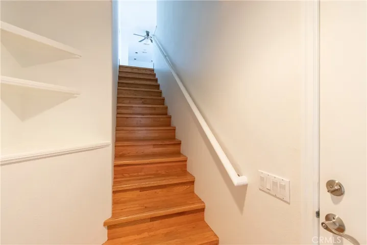 Garage access and stairs to living level.
