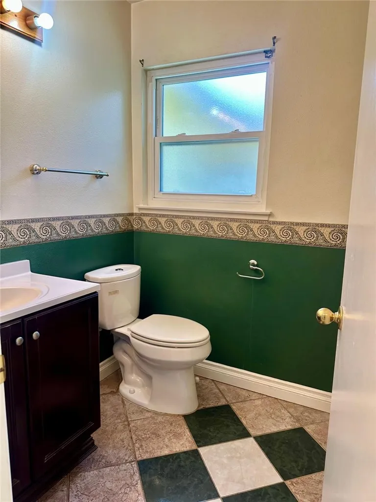 Half bathroom off of the kitchen
