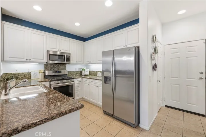 kitchen includes refrigerator
