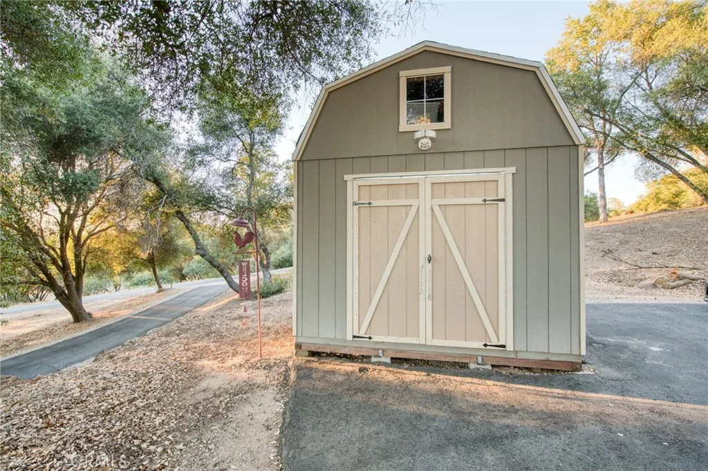 Large, matching detached storage shed or workshop space—ideal for tools, toys, equipment, or country projects.
