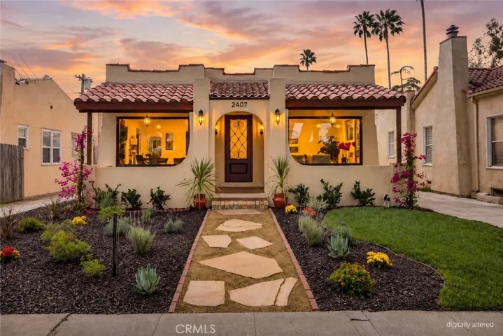 Twilight view of the front exterior (image digitally altered)